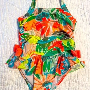 Colorful 1 piece ruched bathing suit.